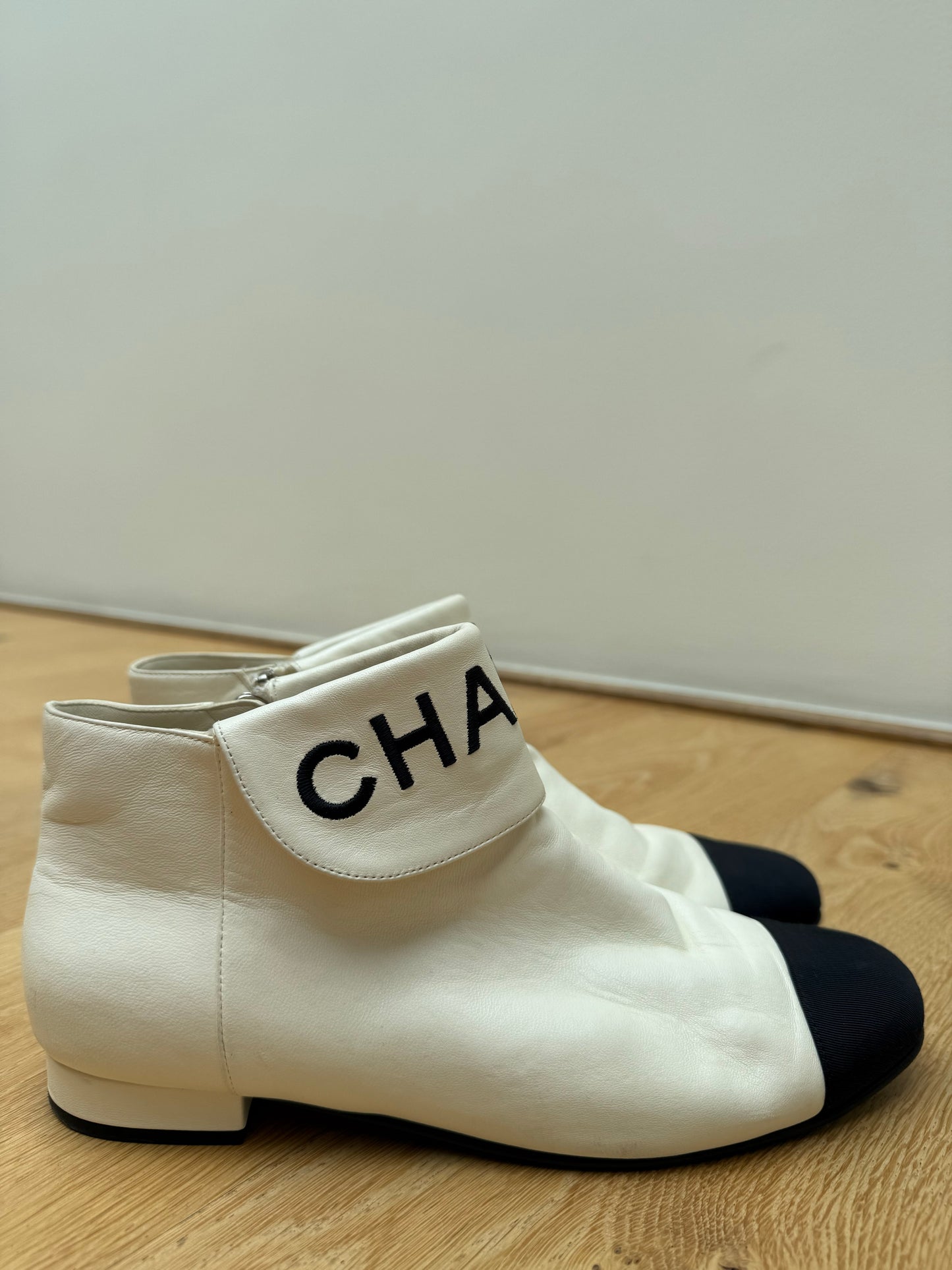 CHANEL logo boots