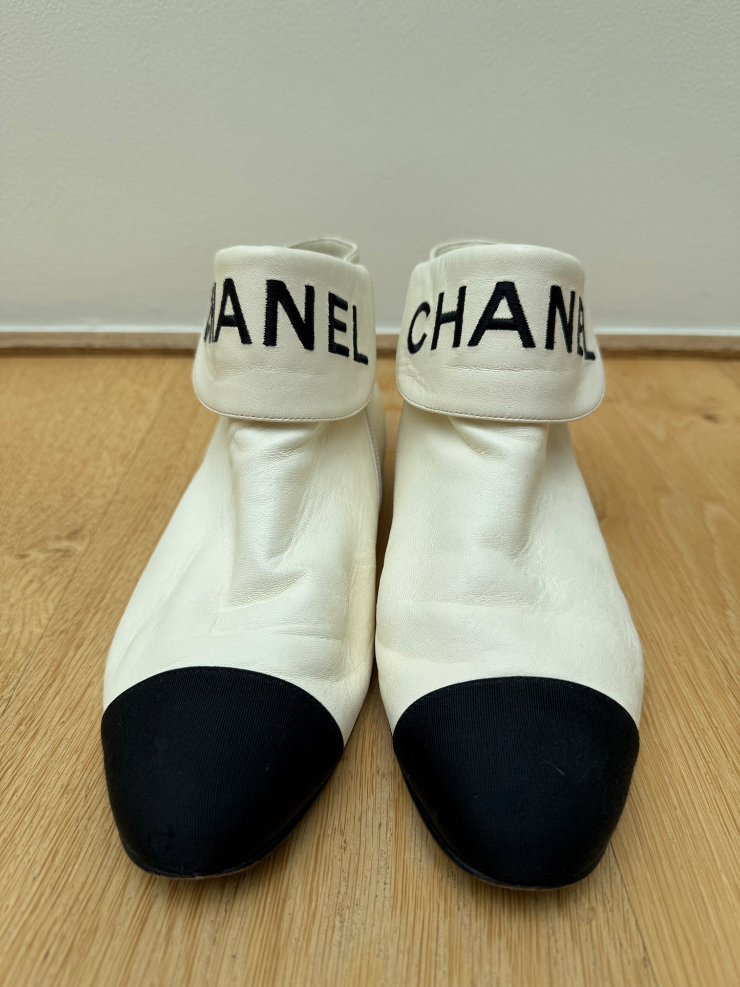 CHANEL logo boots