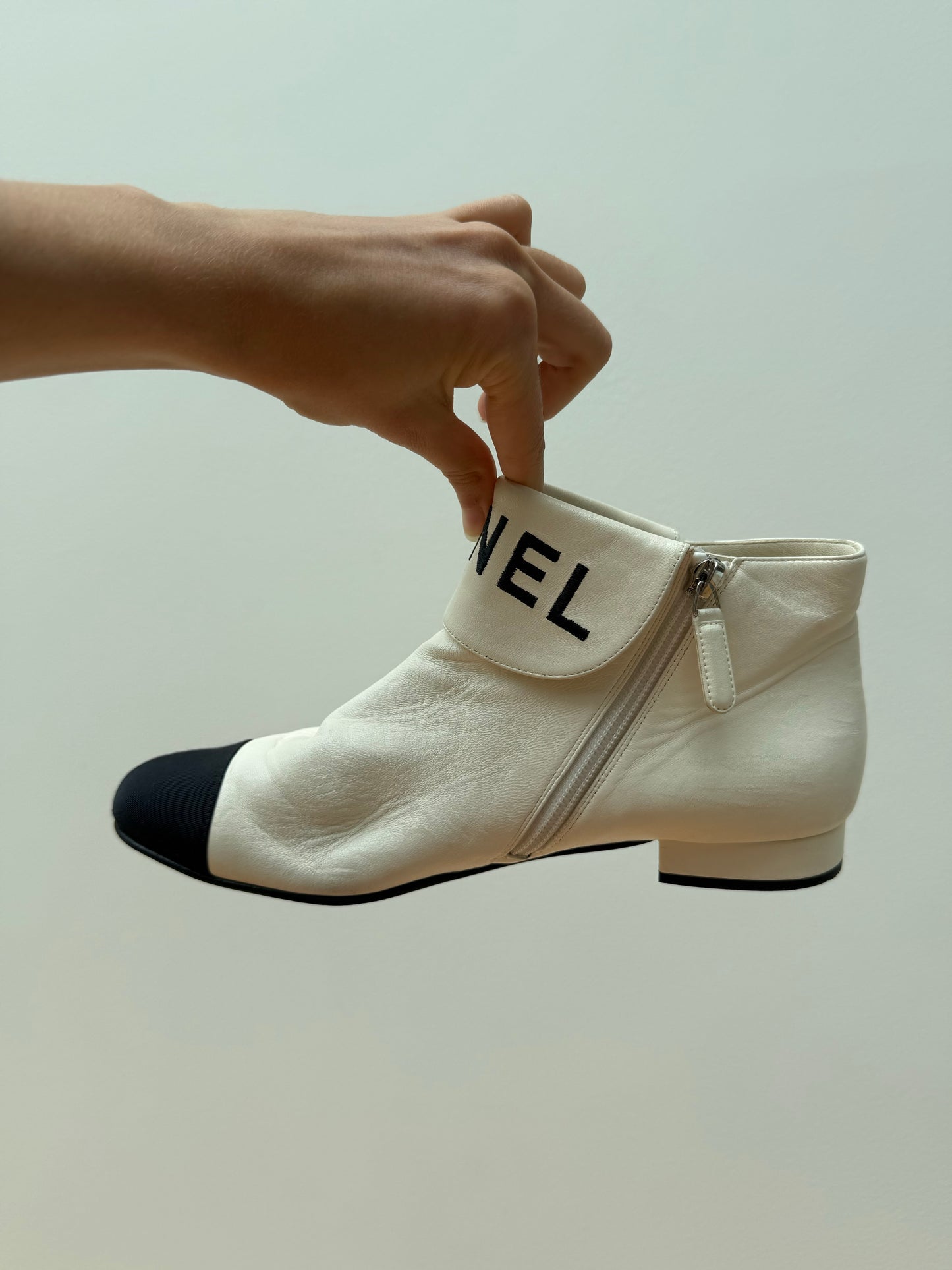 CHANEL logo boots
