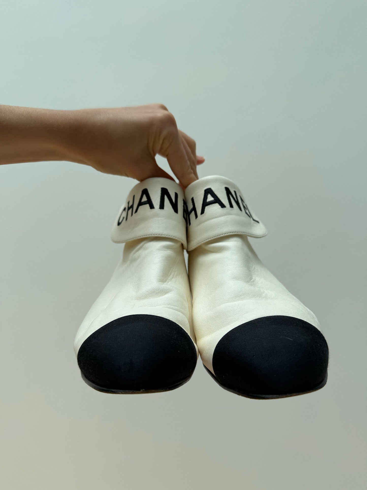 CHANEL logo boots