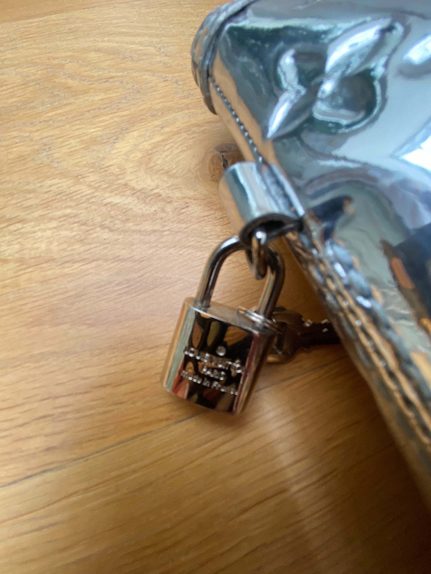 LOUIS VUITTON mirror lockit bag
