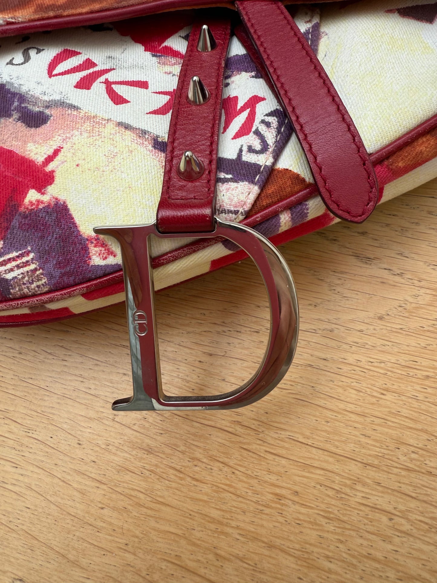 Dior 2003 victim punk saddle bag by Galliano