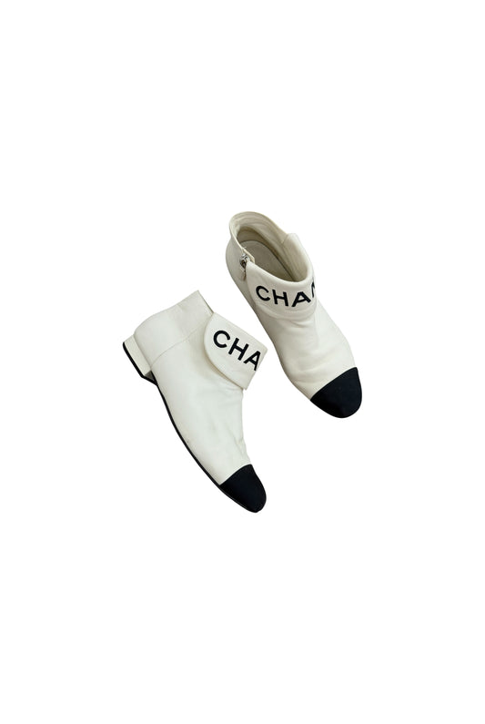 CHANEL logo boots
